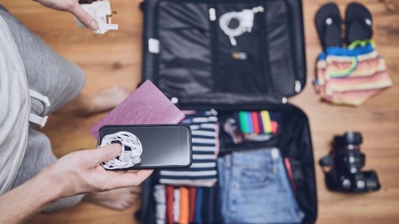 open luggage with ireland travel essentials